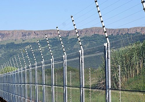 Electric fence along a perimeter